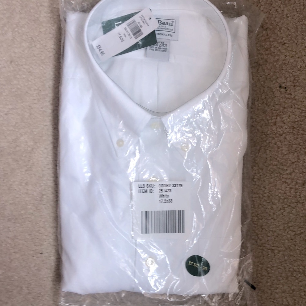 Brand new , original packaging men’s dress shirt. 17.5 x33
